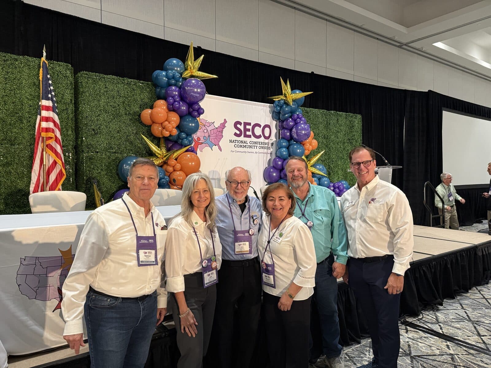 Members of the SECO planning committee in front of the general-session stage